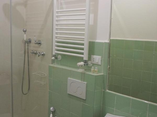 Le coccole : photo 10 de la chambre chambre lits jumeaux avec salle de bains privative