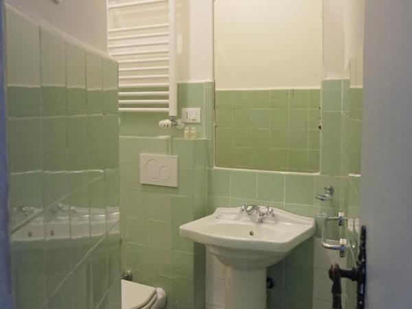 Le coccole : photo 8 de la chambre chambre lits jumeaux avec salle de bains privative