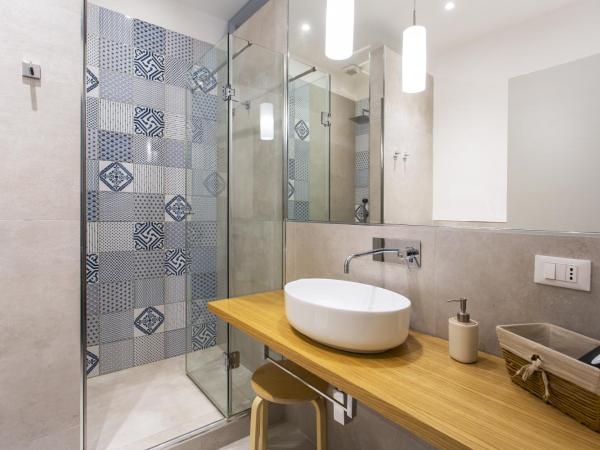 Canceddi Rooms : photo 8 de la chambre grande chambre double ou lits jumeaux