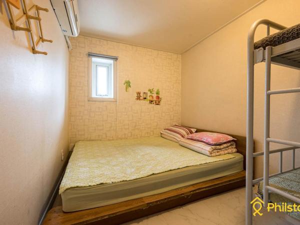 Mamas and Papas Guesthouse and Apartments in Seoul : photo 4 de la chambre chambre quadruple avec salle de bains commune