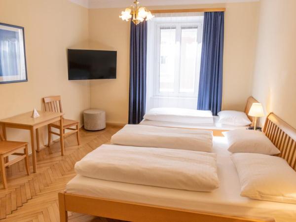 Hotel Mariahilf : photo 1 de la chambre chambre triple supérieure