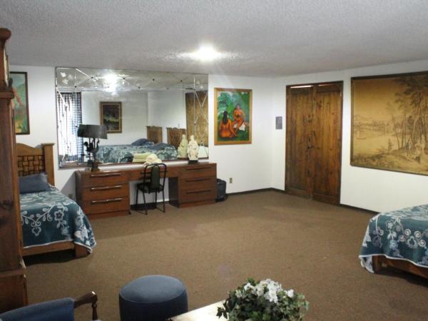 Hostal La Encantada : photo 1 de la chambre chambre triple avec salle de bains commune