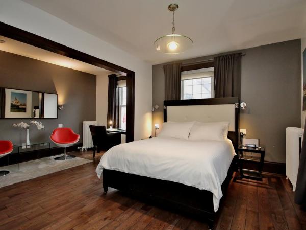 Swiss Hotel : photo 1 de la chambre chambre lit queen-size deluxe avec cheminée