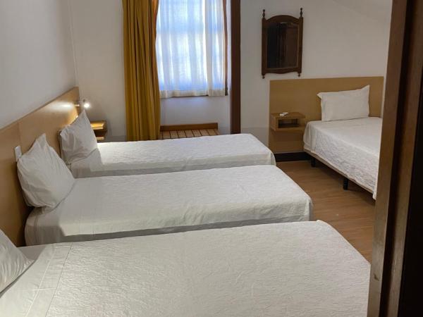 Guesthouse Lusa Atenas : photo 1 de la chambre chambre quadruple