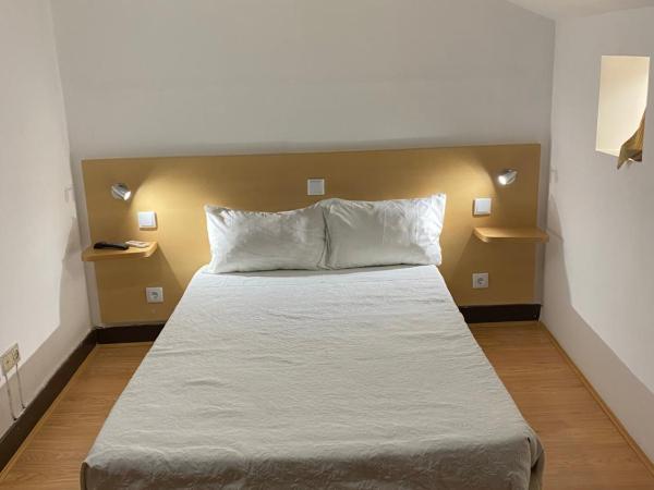 Guesthouse Lusa Atenas : photo 1 de la chambre chambre double ou lits jumeaux Économique