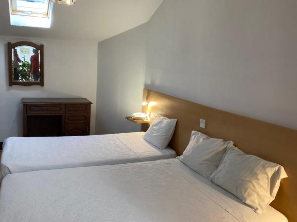 Guesthouse Lusa Atenas : photo 2 de la chambre chambre double ou lits jumeaux Économique