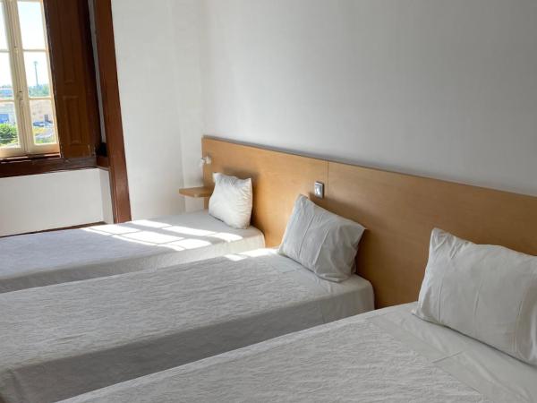 Guesthouse Lusa Atenas : photo 2 de la chambre chambre triple