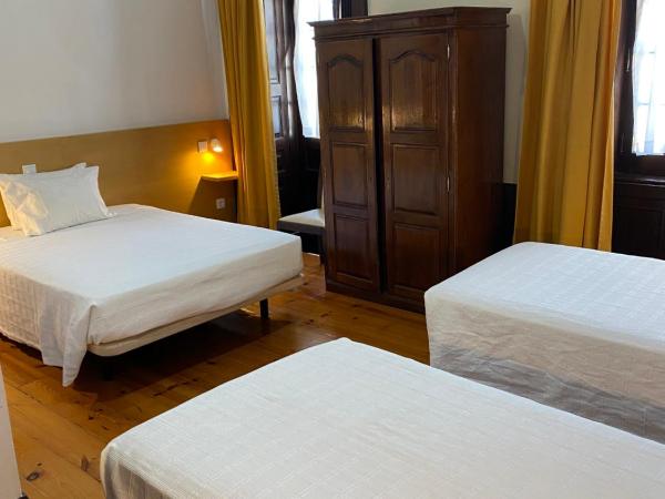 Guesthouse Lusa Atenas : photo 3 de la chambre chambre quadruple