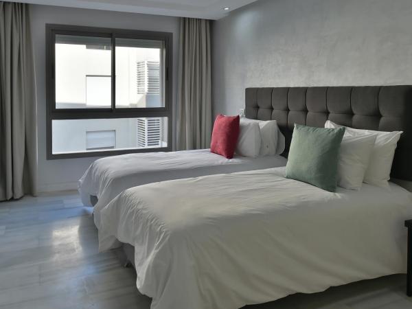 Le Yacht Suites Hotel : photo 3 de la chambre suite exécutive