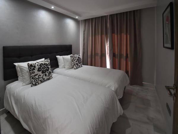 Le Yacht Suites Hotel : photo 3 de la chambre suite familiale