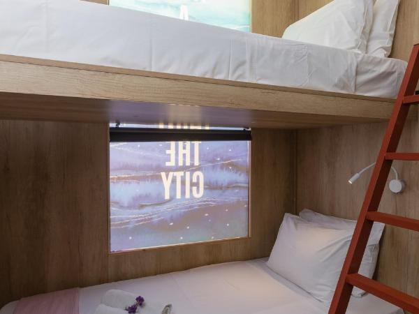 LOC HOSPITALITY Urban Den : photo 7 de la chambre petite chambre lits jumeaux