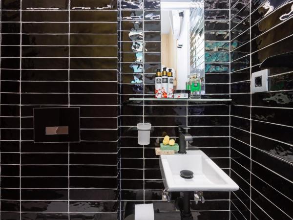 LOC HOSPITALITY Urban Den : photo 9 de la chambre petite chambre lits jumeaux