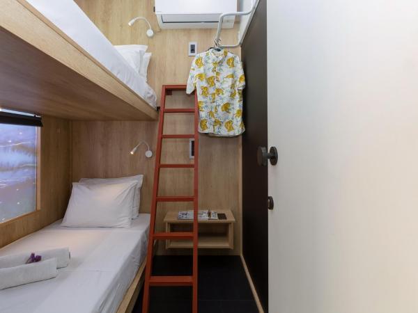 LOC HOSPITALITY Urban Den : photo 4 de la chambre petite chambre lits jumeaux