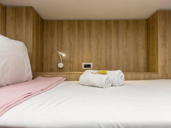 LOC HOSPITALITY Urban Den : photo 7 de la chambre petite chambre lits jumeaux