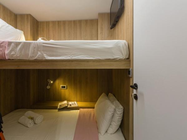 LOC HOSPITALITY Urban Den : photo 5 de la chambre petite chambre lits jumeaux