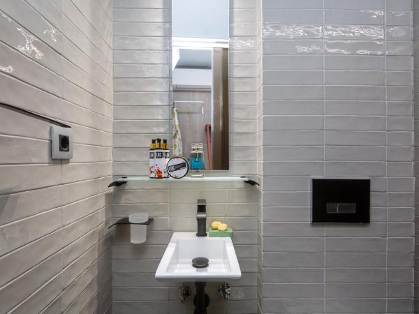 LOC HOSPITALITY Urban Den : photo 8 de la chambre petite chambre lits jumeaux