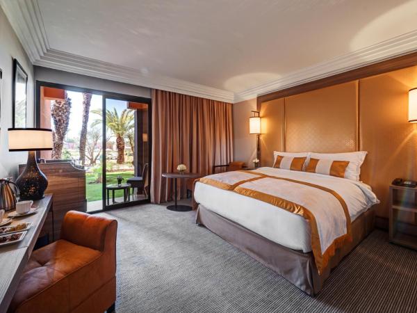 Mövenpick Hotel Mansour Eddahbi Marrakech : photo 2 de la chambre chambre lit king-size deluxe - vue sur jardin