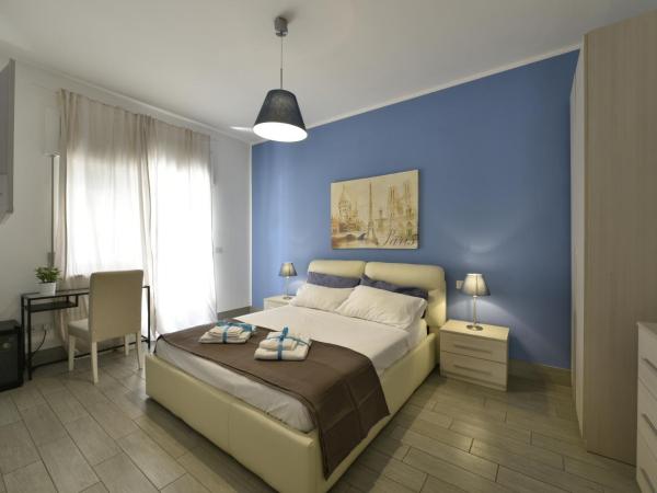 B&B Brothers Suite Vomero : photo 1 de la chambre chambre lit king-size avec balcon