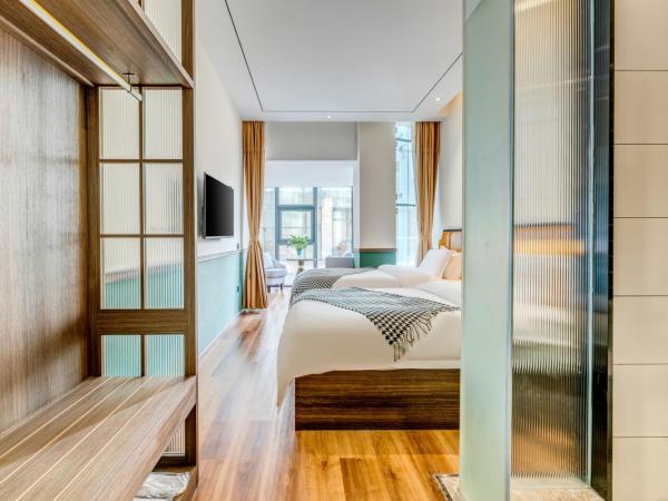 Happy Dragon City Culture Hotel-Tianjin Draum Tower & Dayuecheng shopping mall : photo 4 de la chambre chambre lits jumeaux avec salle de bains privative