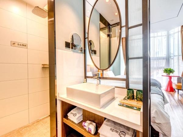 Happy Dragon City Culture Hotel-Tianjin Draum Tower & Dayuecheng shopping mall : photo 10 de la chambre chambre lits jumeaux avec salle de bains privative