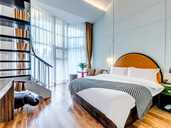 Happy Dragon City Culture Hotel-Tianjin Draum Tower & Dayuecheng shopping mall : photo 6 de la chambre suite en duplex