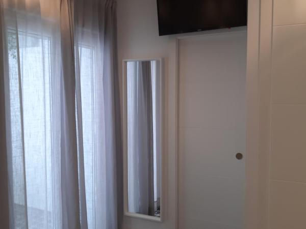 Room Boutique 32 : photo 8 de la chambre chambre double avec patio