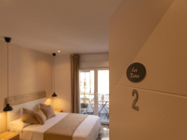 Room Boutique 32 : photo 1 de la chambre chambre lit queen-size avec balcon