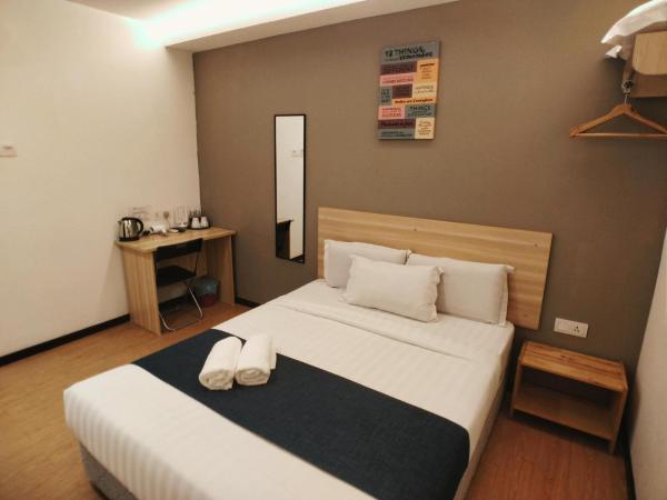 1Orange Hotel Sri Petaling : photo 4 de la chambre chambre standard lit queen-size