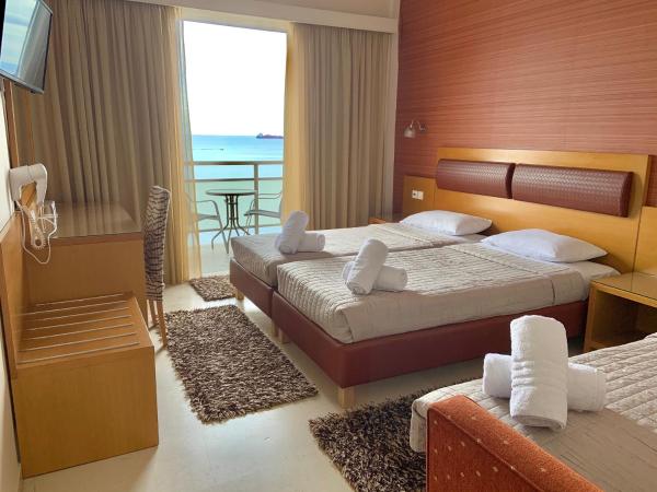 Hotel Flisvos : photo 3 de la chambre chambre triple - vue sur mer