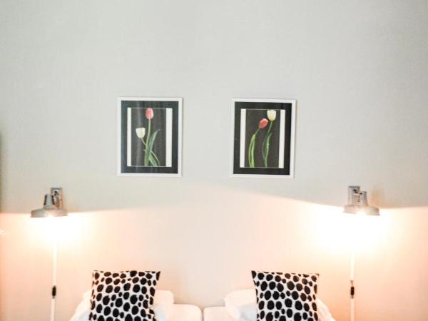 Family Hotel Kooyk : photo 1 de la chambre chambre triple avec salle de bains commune