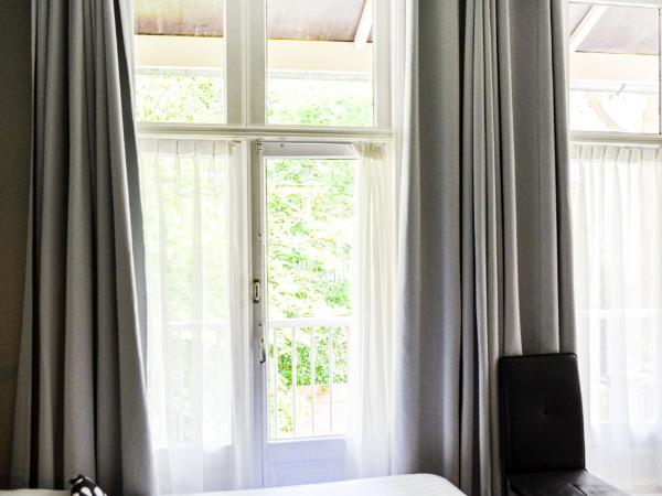 Family Hotel Kooyk : photo 2 de la chambre chambre triple avec salle de bains commune