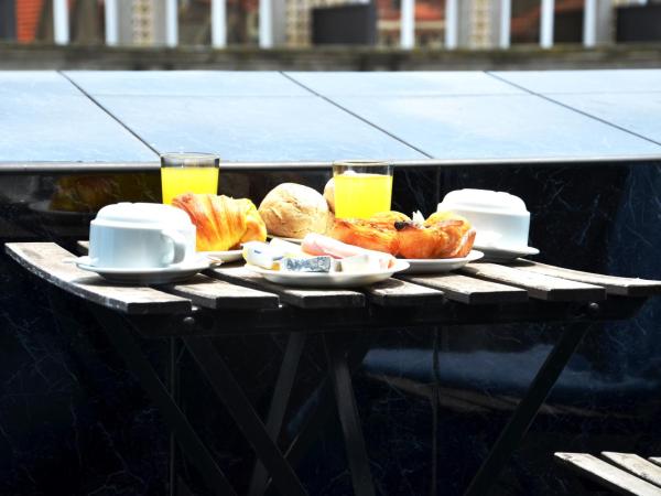 Hotel Girassol : photo 2 de la chambre chambre double deluxe avec balcon