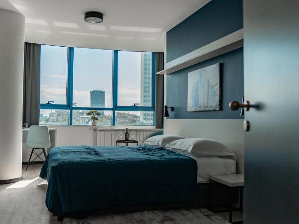 Hotel Blue : photo 6 de la chambre chambre double ou lits jumeaux - vue sur ville
