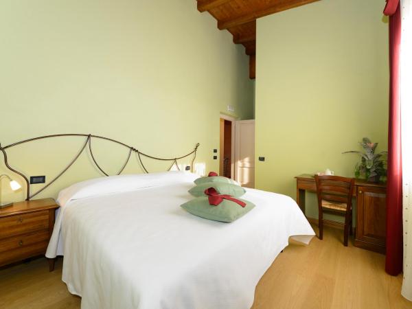 Agriturismo Bacche di Bosco : photo 1 de la chambre chambre double ou lits jumeaux