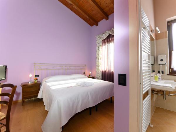 Agriturismo Bacche di Bosco : photo 10 de la chambre chambre double ou lits jumeaux