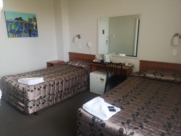 Kiwi International Hotel : photo 1 de la chambre chambre lits jumeaux avec salle de bains