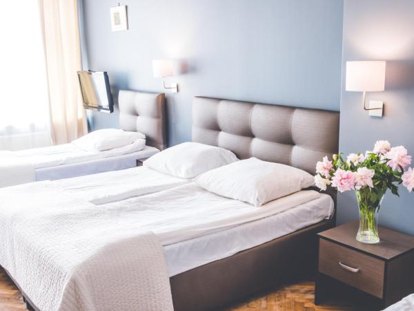 Hotel Floryan Old Town : photo 1 de la chambre chambre triple supérieure