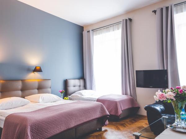 Hotel Floryan Old Town : photo 4 de la chambre chambre triple supérieure