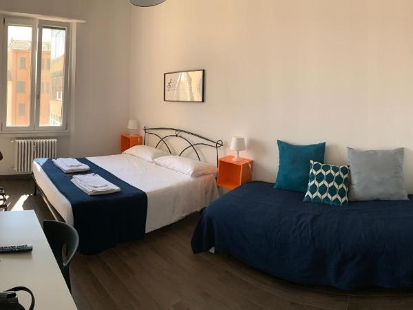 Mambo Suites : photo 2 de la chambre chambre double deluxe avec lit d'appoint
