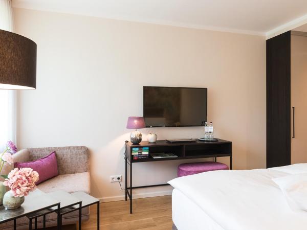 Hotel Munte am Stadtwald : photo 5 de la chambre chambre double supérieure