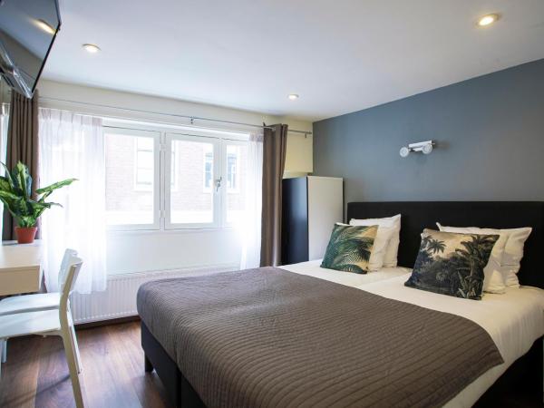 Quentin Arrive Hotel : photo 1 de la chambre chambre lits jumeaux avec salle de bains privative