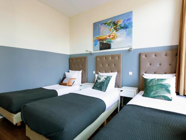 Quentin Arrive Hotel : photo 4 de la chambre chambre triple avec salle de bains privative