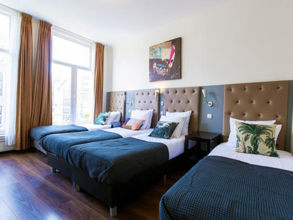 Quentin Arrive Hotel : photo 1 de la chambre chambre quadruple avec salle de bains commune