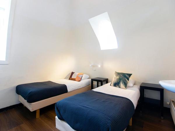 Quentin Arrive Hotel : photo 2 de la chambre chambre lits jumeaux avec salle de bains commune