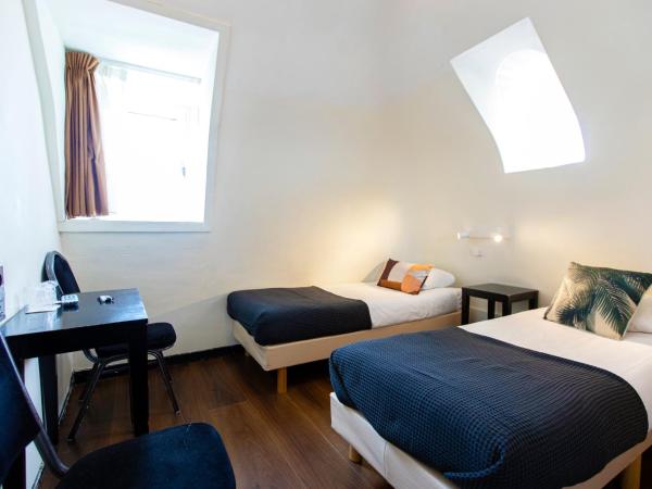 Quentin Arrive Hotel : photo 1 de la chambre chambre lits jumeaux avec salle de bains commune