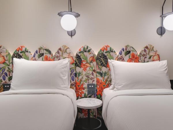 Naumi Studio Wellington : photo 6 de la chambre hébergement lits jumeaux zing