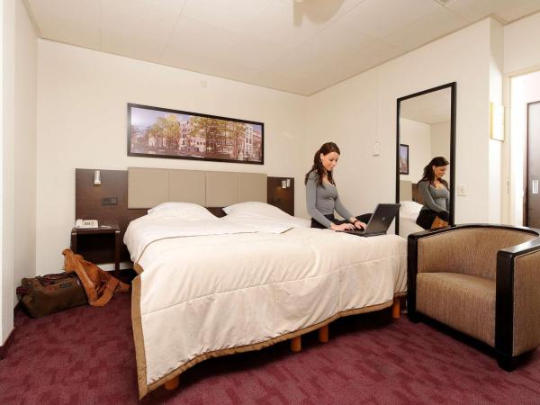 Best Western Dam Square Inn : photo 2 de la chambre chambre lits jumeaux