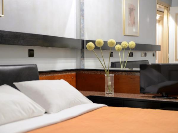 Victory Inn : photo 3 de la chambre chambre double avec petit balcon