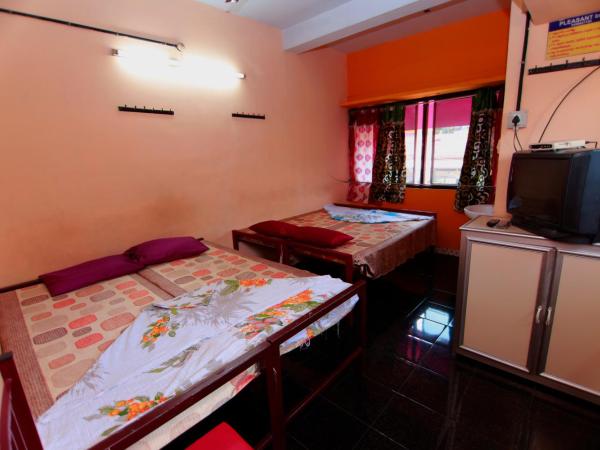 Pleasant Inn : photo 1 de la chambre chambre quadruple Économique