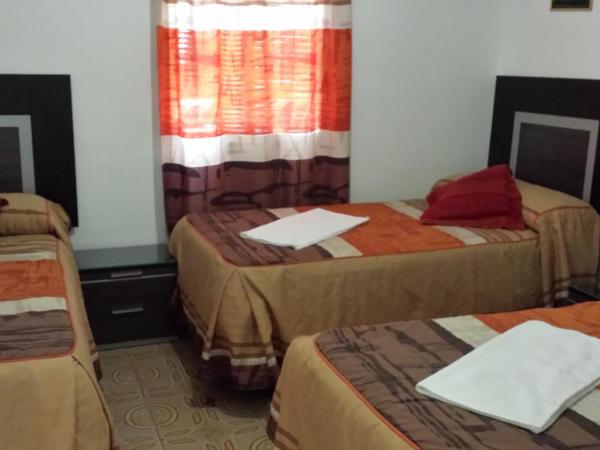 Pension Gran Plaza : photo 3 de la chambre chambre triple basique